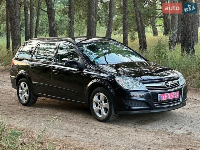 Черный Опель Астра, объемом двигателя 1.6 л и пробегом 230 тыс. км за 5350 $, фото 1 на Automoto.ua