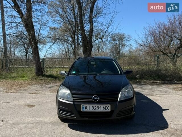 Черный Опель Астра, объемом двигателя 1.9 л и пробегом 325 тыс. км за 4999 $, фото 1 на Automoto.ua
