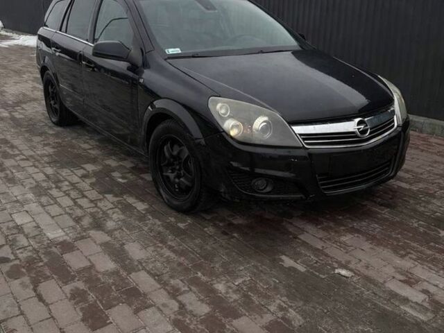 Черный Опель Астра, объемом двигателя 1.9 л и пробегом 305 тыс. км за 1800 $, фото 1 на Automoto.ua