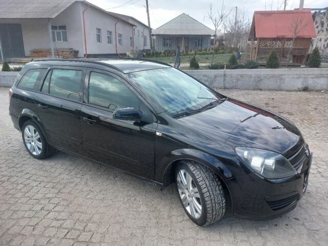 Черный Опель Астра, объемом двигателя 1.7 л и пробегом 280 тыс. км за 5350 $, фото 1 на Automoto.ua