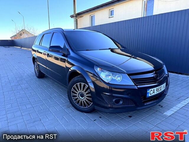 Черный Опель Астра, объемом двигателя 1.6 л и пробегом 235 тыс. км за 4999 $, фото 1 на Automoto.ua