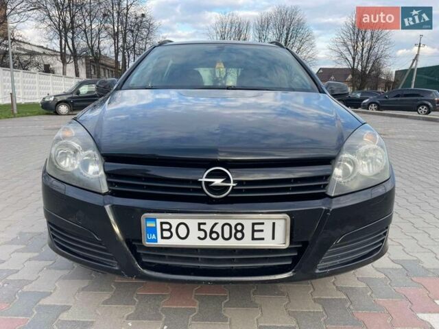 Черный Опель Астра, объемом двигателя 1.7 л и пробегом 250 тыс. км за 3950 $, фото 1 на Automoto.ua
