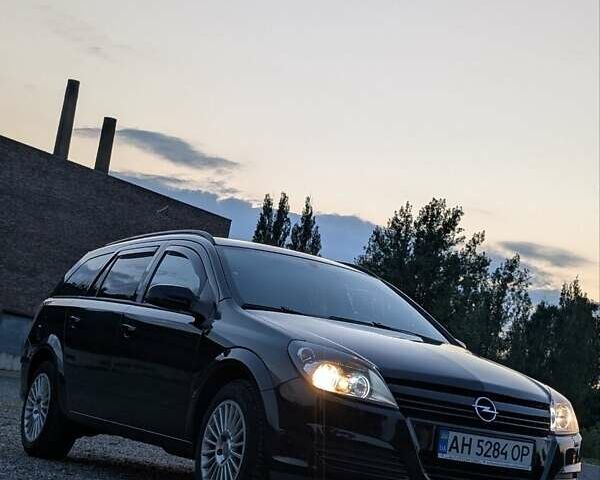 Черный Опель Астра, объемом двигателя 1.6 л и пробегом 245 тыс. км за 4500 $, фото 1 на Automoto.ua