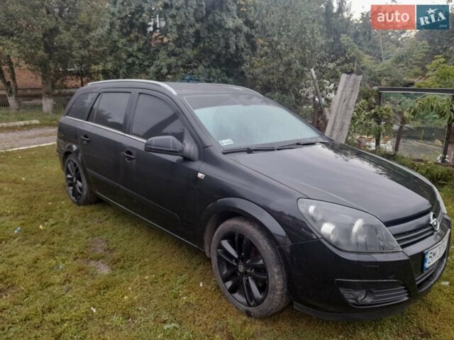 Чорний Опель Астра, об'ємом двигуна 1.8 л та пробігом 255 тис. км за 6300 $, фото 1 на Automoto.ua