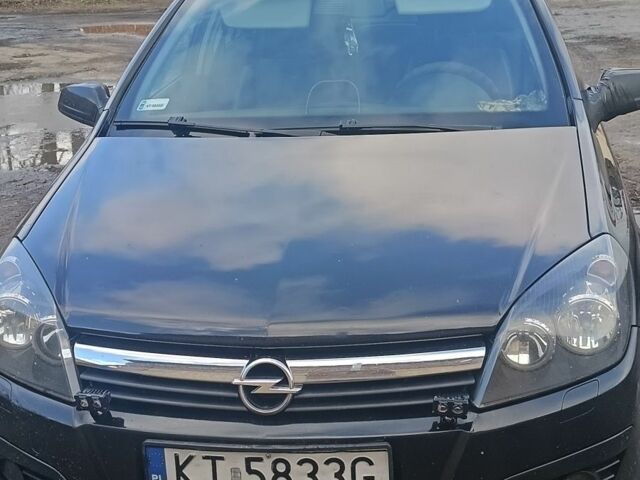 Черный Опель Астра, объемом двигателя 1.9 л и пробегом 356 тыс. км за 2839 $, фото 1 на Automoto.ua
