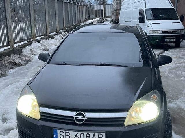 Черный Опель Астра, объемом двигателя 1.7 л и пробегом 330 тыс. км за 3300 $, фото 1 на Automoto.ua