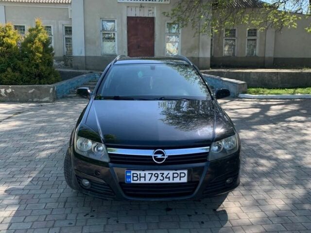 Черный Опель Астра, объемом двигателя 1.7 л и пробегом 280 тыс. км за 3900 $, фото 1 на Automoto.ua