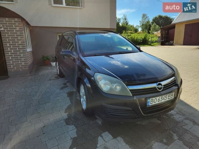 Черный Опель Астра, объемом двигателя 1.6 л и пробегом 293 тыс. км за 3600 $, фото 1 на Automoto.ua
