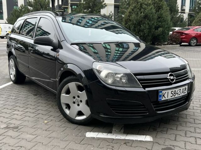 Черный Опель Астра, объемом двигателя 1.7 л и пробегом 330 тыс. км за 5200 $, фото 1 на Automoto.ua