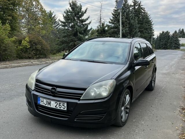 Черный Опель Астра, объемом двигателя 1.9 л и пробегом 333 тыс. км за 2600 $, фото 1 на Automoto.ua