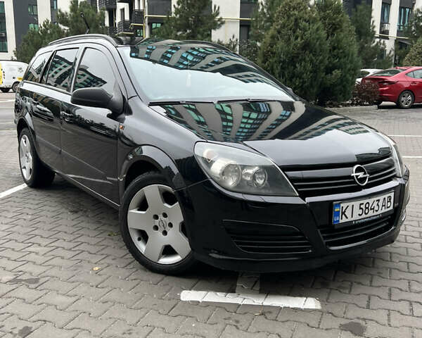 Черный Опель Астра, объемом двигателя 1.7 л и пробегом 330 тыс. км за 5200 $, фото 1 на Automoto.ua