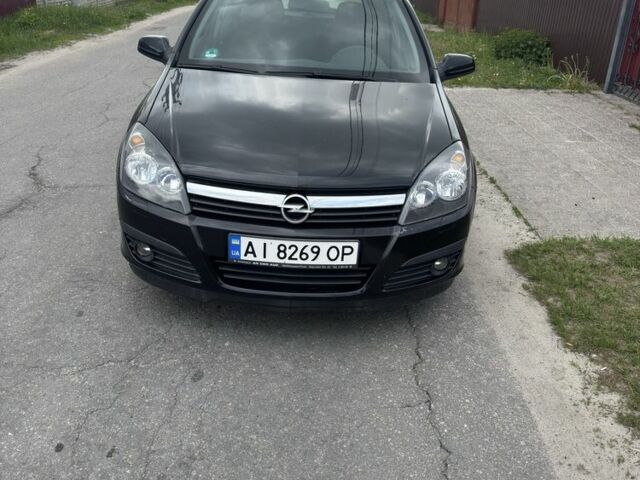 Черный Опель Астра, объемом двигателя 1.9 л и пробегом 200 тыс. км за 5000 $, фото 1 на Automoto.ua