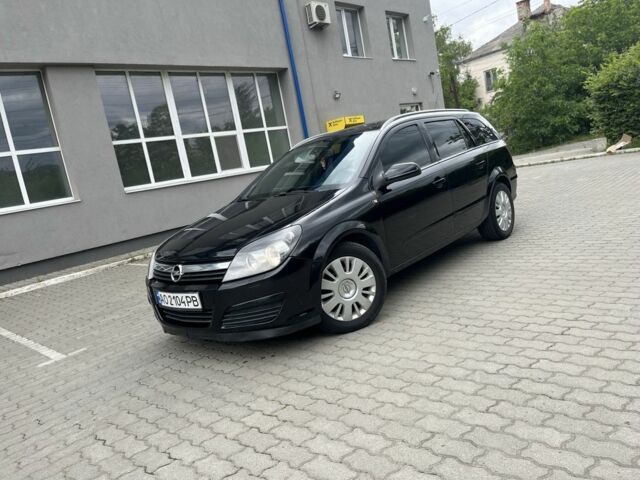 Черный Опель Астра, объемом двигателя 1.7 л и пробегом 340 тыс. км за 3800 $, фото 1 на Automoto.ua