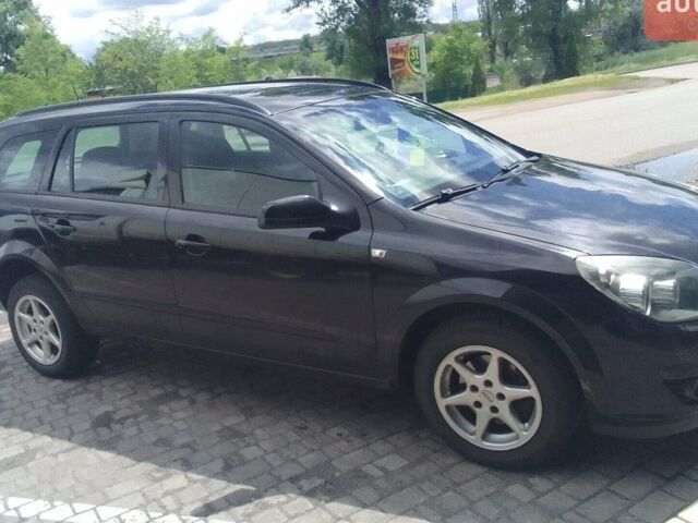 Черный Опель Астра, объемом двигателя 1.8 л и пробегом 338 тыс. км за 4550 $, фото 1 на Automoto.ua