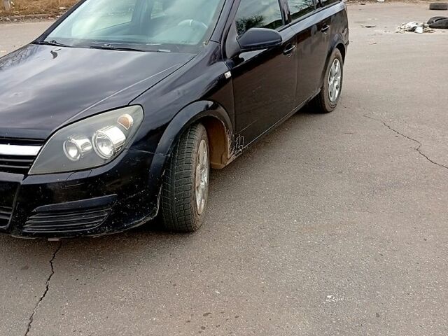 Черный Опель Астра, объемом двигателя 1.7 л и пробегом 344 тыс. км за 3200 $, фото 1 на Automoto.ua