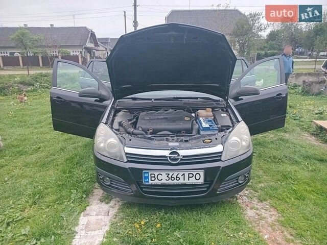 Черный Опель Астра, объемом двигателя 1.9 л и пробегом 282 тыс. км за 4600 $, фото 1 на Automoto.ua