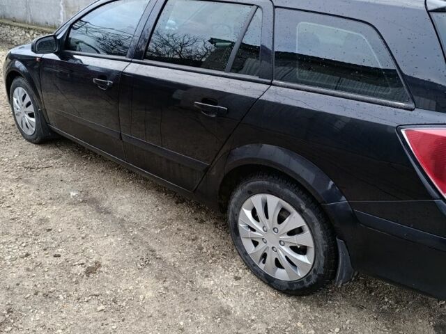 Черный Опель Астра, объемом двигателя 1.7 л и пробегом 268 тыс. км за 3600 $, фото 1 на Automoto.ua