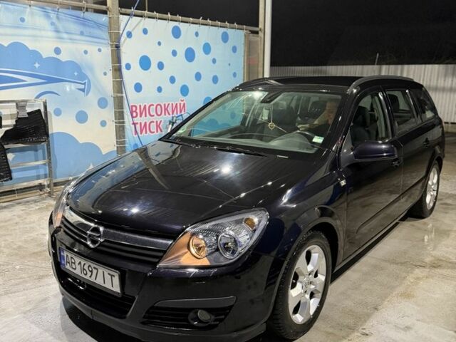 Черный Опель Астра, объемом двигателя 1.8 л и пробегом 233 тыс. км за 5750 $, фото 1 на Automoto.ua