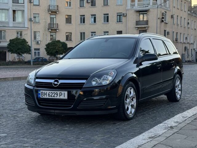 Черный Опель Астра, объемом двигателя 1.9 л и пробегом 300 тыс. км за 3914 $, фото 1 на Automoto.ua