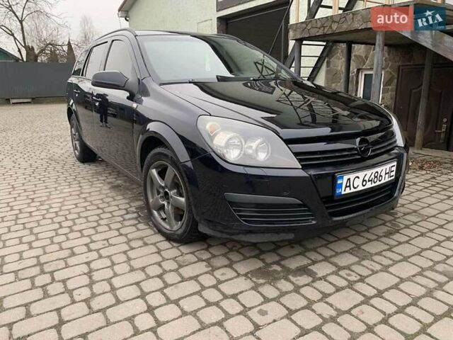 Чорний Опель Астра, об'ємом двигуна 1.25 л та пробігом 317 тис. км за 3500 $, фото 1 на Automoto.ua
