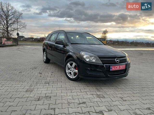 Черный Опель Астра, объемом двигателя 1.8 л и пробегом 164 тыс. км за 4599 $, фото 1 на Automoto.ua