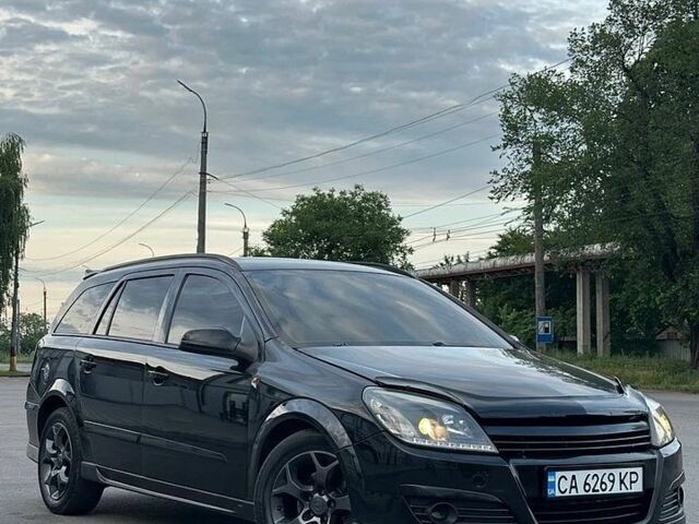 Черный Опель Астра, объемом двигателя 1.6 л и пробегом 299 тыс. км за 4850 $, фото 1 на Automoto.ua