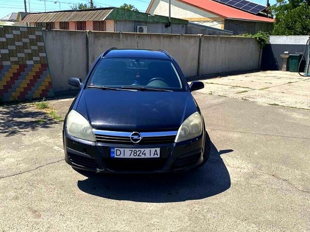 Черный Опель Астра, объемом двигателя 1.8 л и пробегом 225 тыс. км за 4300 $, фото 1 на Automoto.ua