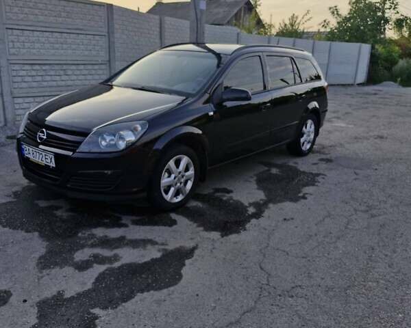 Черный Опель Астра, объемом двигателя 1.6 л и пробегом 270 тыс. км за 5300 $, фото 1 на Automoto.ua