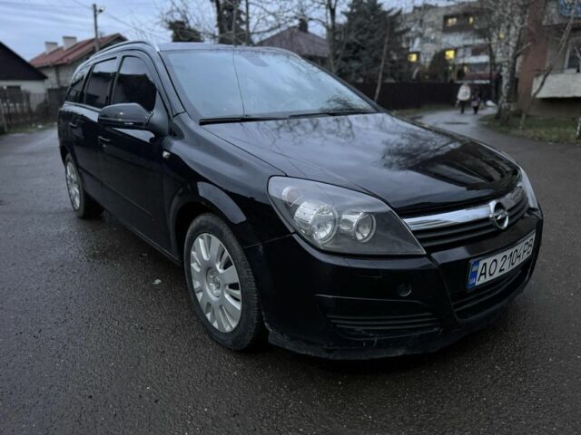 Черный Опель Астра, объемом двигателя 1.7 л и пробегом 200 тыс. км за 3599 $, фото 1 на Automoto.ua
