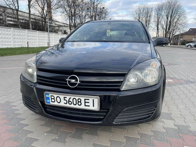 Черный Опель Астра, объемом двигателя 1.7 л и пробегом 250 тыс. км за 3950 $, фото 1 на Automoto.ua