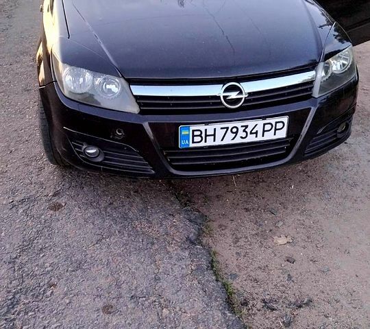 Черный Опель Астра, объемом двигателя 1.7 л и пробегом 200 тыс. км за 4299 $, фото 1 на Automoto.ua