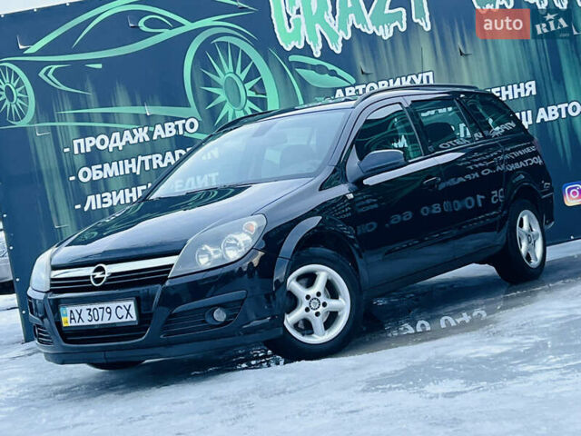 Черный Опель Астра, объемом двигателя 1.4 л и пробегом 243 тыс. км за 4400 $, фото 1 на Automoto.ua