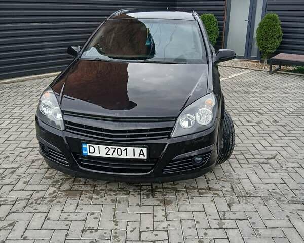 Черный Опель Астра, объемом двигателя 1.2 л и пробегом 350 тыс. км за 4400 $, фото 1 на Automoto.ua