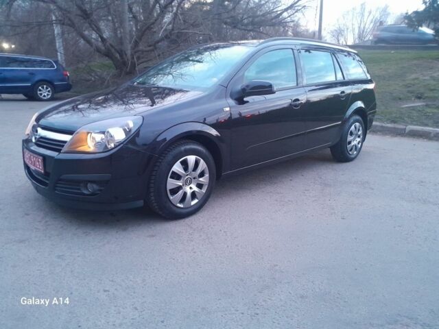 Черный Опель Астра, объемом двигателя 1 л и пробегом 154 тыс. км за 5250 $, фото 1 на Automoto.ua