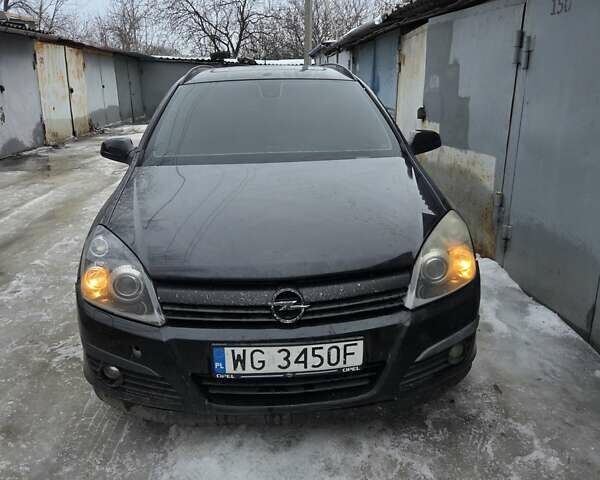 Черный Опель Астра, объемом двигателя 1.9 л и пробегом 358 тыс. км за 2200 $, фото 1 на Automoto.ua