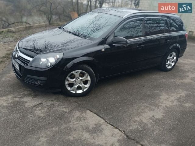 Черный Опель Астра, объемом двигателя 1.6 л и пробегом 258 тыс. км за 4999 $, фото 1 на Automoto.ua