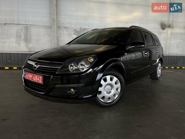 Черный Опель Астра, объемом двигателя 1.6 л и пробегом 207 тыс. км за 4999 $, фото 1 на Automoto.ua