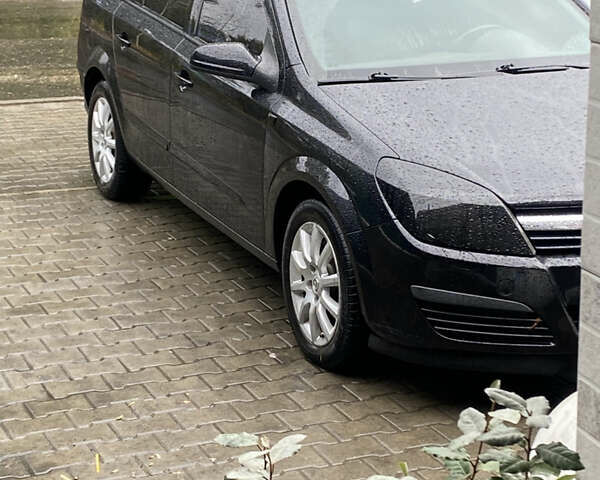 Черный Опель Астра, объемом двигателя 1.9 л и пробегом 280 тыс. км за 4500 $, фото 1 на Automoto.ua