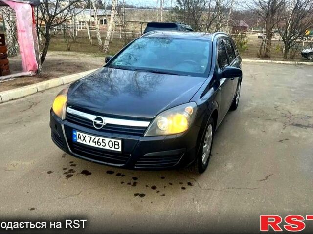 Черный Опель Астра, объемом двигателя 1.2 л и пробегом 368 тыс. км за 3800 $, фото 1 на Automoto.ua