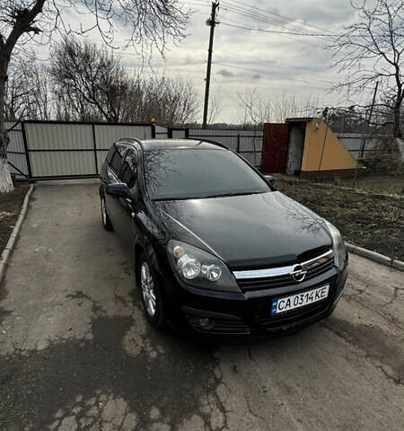 Чорний Опель Астра, об'ємом двигуна 1.8 л та пробігом 194 тис. км за 6400 $, фото 1 на Automoto.ua