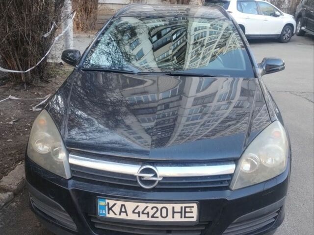Черный Опель Астра, объемом двигателя 1.8 л и пробегом 223 тыс. км за 5200 $, фото 1 на Automoto.ua