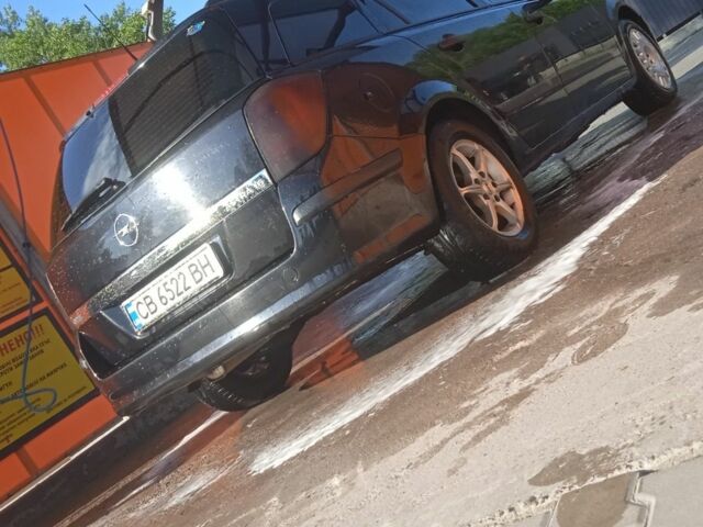 Черный Опель Астра, объемом двигателя 1.6 л и пробегом 300 тыс. км за 3400 $, фото 1 на Automoto.ua