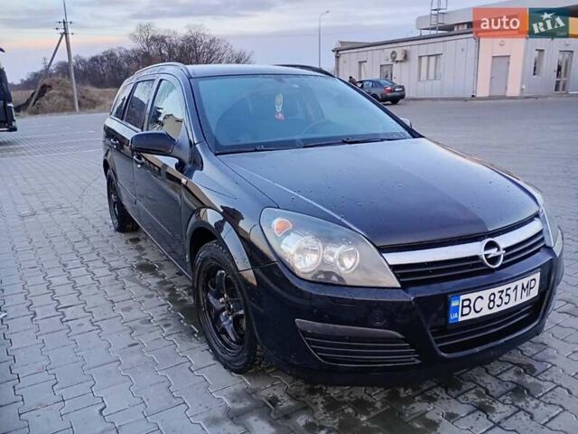 Черный Опель Астра, объемом двигателя 1.6 л и пробегом 290 тыс. км за 5000 $, фото 1 на Automoto.ua