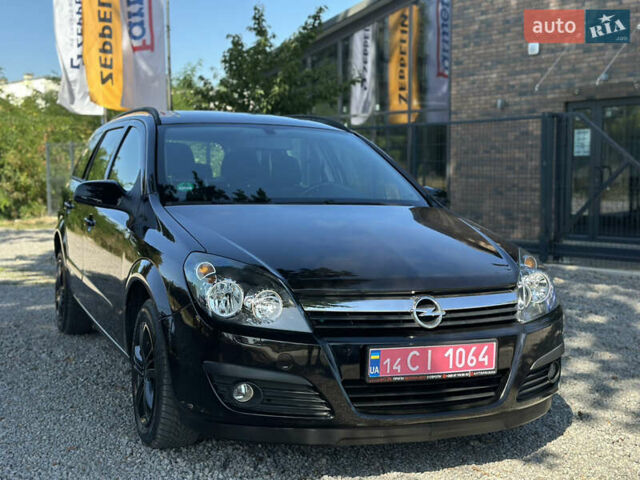 Черный Опель Астра, объемом двигателя 1.6 л и пробегом 241 тыс. км за 5700 $, фото 1 на Automoto.ua