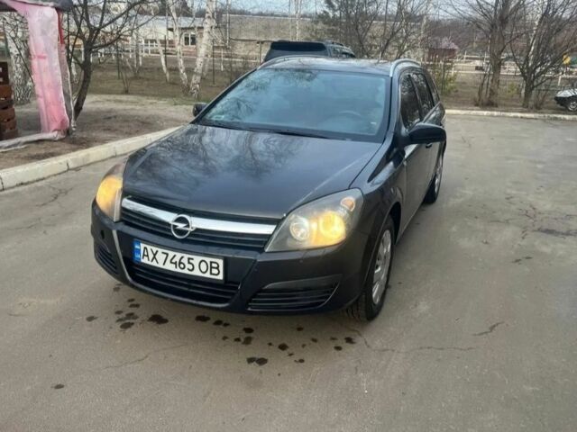 Черный Опель Астра, объемом двигателя 1.2 л и пробегом 300 тыс. км за 3400 $, фото 1 на Automoto.ua