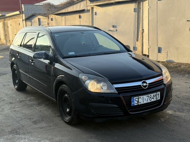 Черный Опель Астра, объемом двигателя 1.9 л и пробегом 300 тыс. км за 2000 $, фото 1 на Automoto.ua