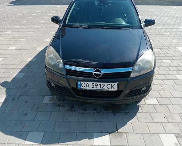 Черный Опель Астра, объемом двигателя 1.8 л и пробегом 289 тыс. км за 6200 $, фото 1 на Automoto.ua