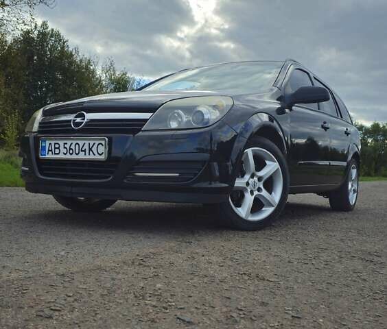 Черный Опель Астра, объемом двигателя 1.8 л и пробегом 260 тыс. км за 5200 $, фото 1 на Automoto.ua