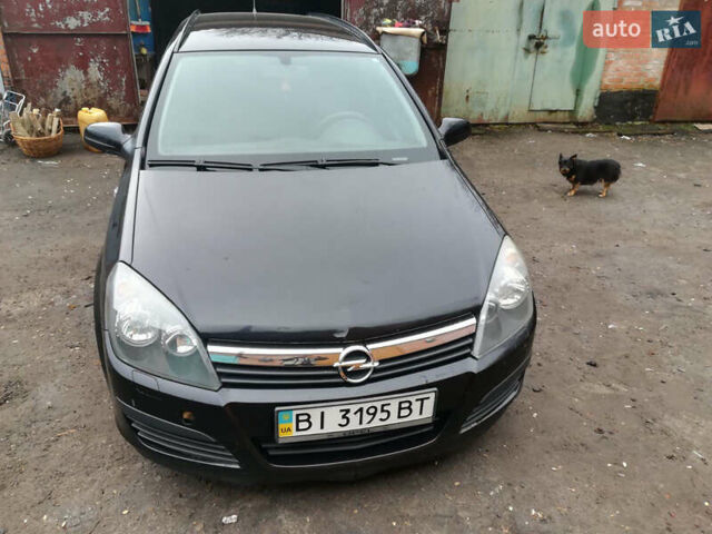 Черный Опель Астра, объемом двигателя 1.3 л и пробегом 163 тыс. км за 4900 $, фото 1 на Automoto.ua
