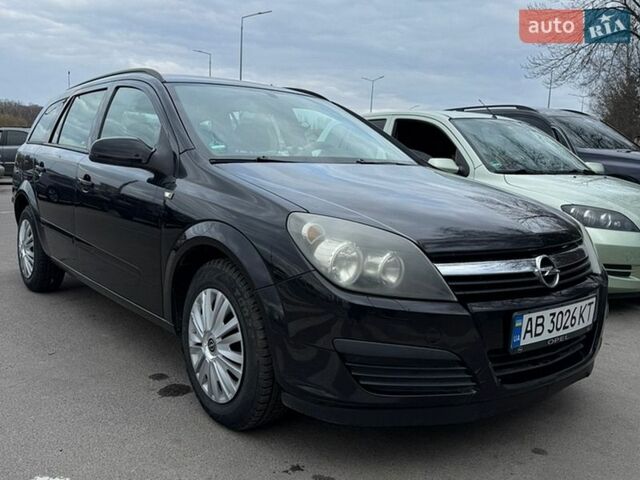 Черный Опель Астра, объемом двигателя 1.6 л и пробегом 243 тыс. км за 5500 $, фото 1 на Automoto.ua